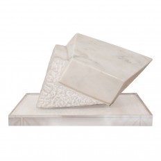 Textured marble sculpture with Lucite base