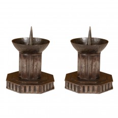 Pair of patinated iron candlesticks