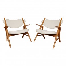 Pair of unusual wood frame armchairs