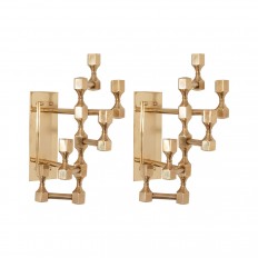 Pair of brass geometric motif candlestick sconces