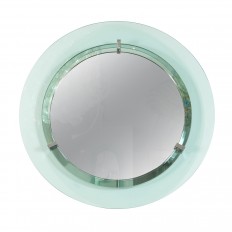 Circular mirror with pale green glass surround